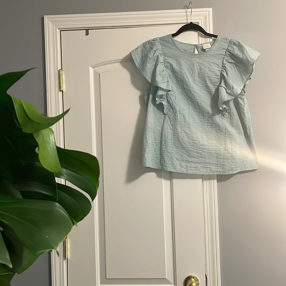 A New Day Mint green top size large with ruffle cap sleeves. Light and loose